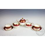 A Victorian Coalport tea service for two, comprising; a teapot and cover, teacups and saucers,