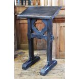 An early 20th century stained wood lectern of ecclesiastical form,