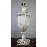 A Neo-classical veined white marble lamp, of fluted urn form, on square base,