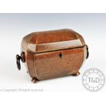 A 19th century yew wood tea caddy, with loop handles, on turned feet, 15.5cm H x 24cm W x 13cm D.