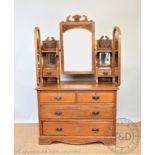 An Edwardian carved ash dressing table,