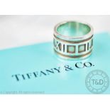 A Tiffany & Co silver Atlas ring, the broad band cast with Roman numerals,