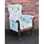 A William IV mahogany library chair, with later button back floral upholstery,