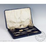 A late Victorian silver nine piece manicure set, Birmingham, 1900,