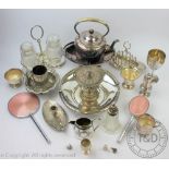 A collection of silver plated wares to include teapots, coffee pots, bread baskets, preserve jars,