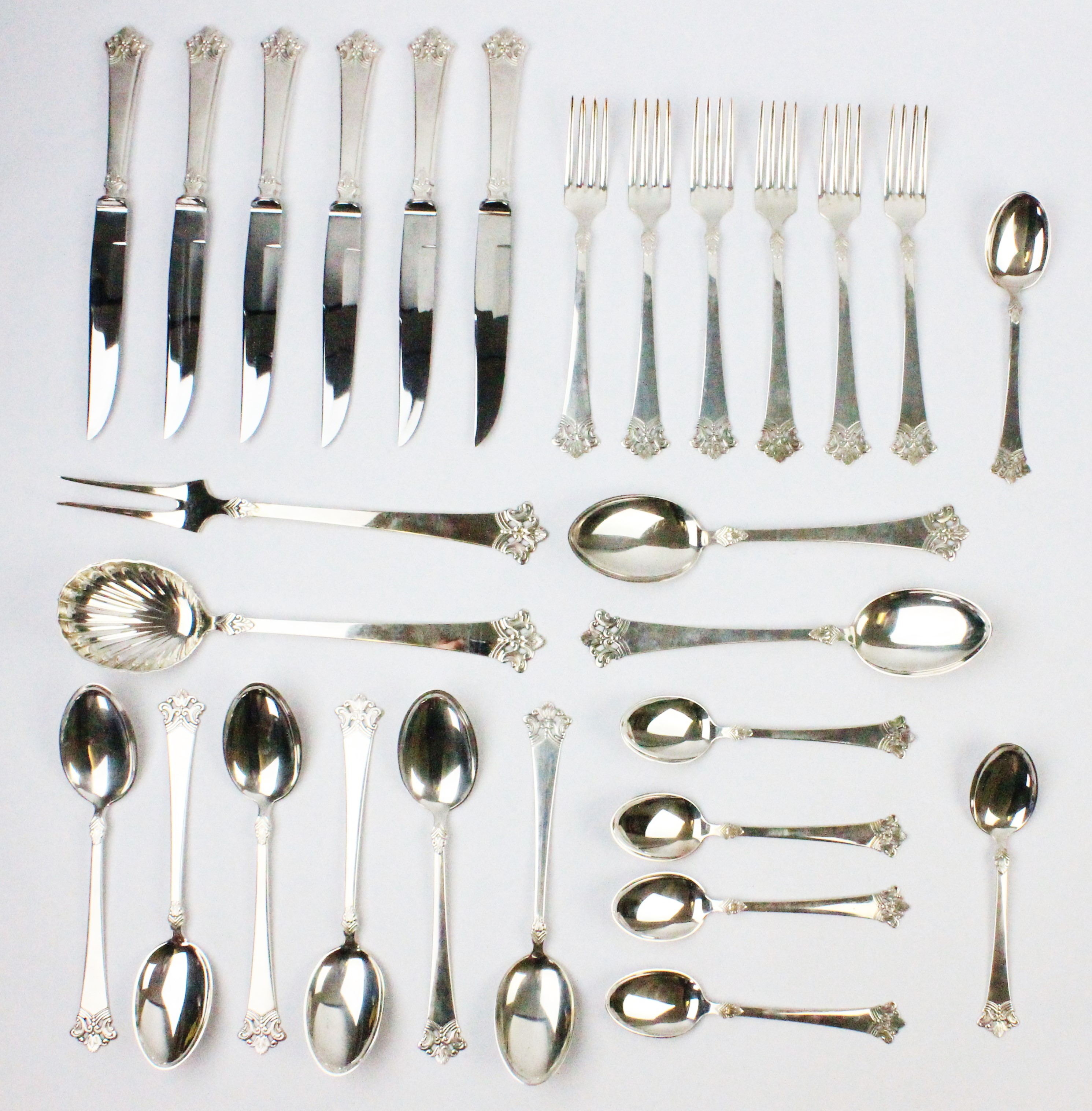 A Norwegian silver Anitra pattern part canteen by Magnus Aase, 830S, comprising; six knives,