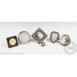 Six Victorian and later silver miniature photograph frames including; three circular examples,