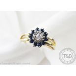 A diamond and sapphire cluster ring,