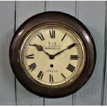 A reproduction circular wall clock named 'S.I.