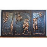 A pair of embossed copper panels, possibly Dutch, decorated with a bearded figure, monkey and bird,