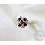 A ruby and diamond cluster ring,