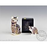 Two Royal Crown Derby paperweights; Sitting Kitten and Crouching Kitten, both with gold stoppers,