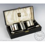 A cased silver condiment set Lowe & Sons, Chester 1937,