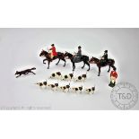 A collection Britains painted lead hunting figures comprising; huntsman on horseback,