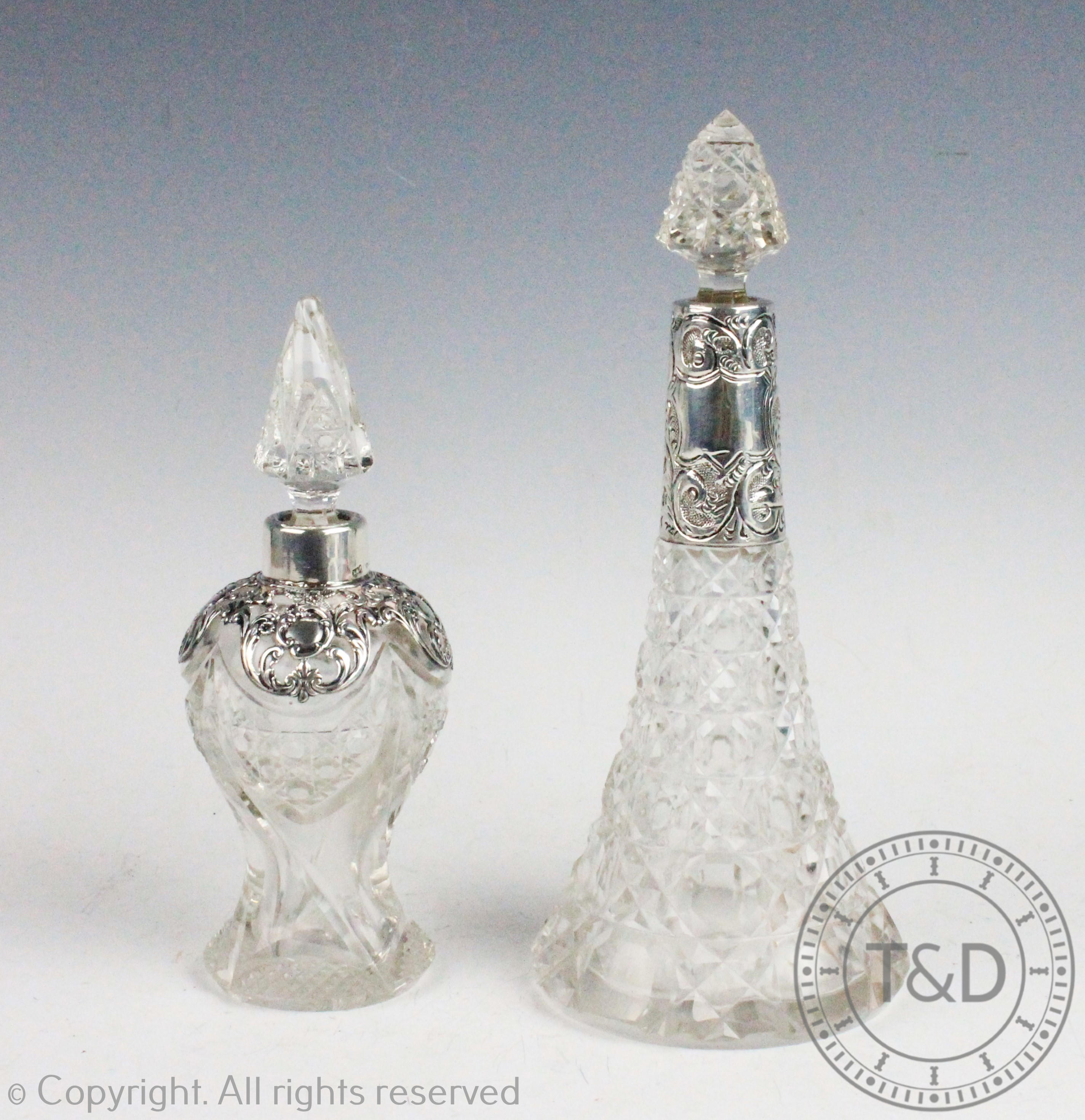 An Edwardian silver mounted perfume bottle Levi and Salaman, Birmingham 1907,