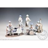 A Lladro six piece Jazz Band, comprising piano player and female singer, trumpeter, clarinetist,