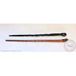A Japanese carved bamboo walking stick, the terminal worked as a sage on a horse with female beside,