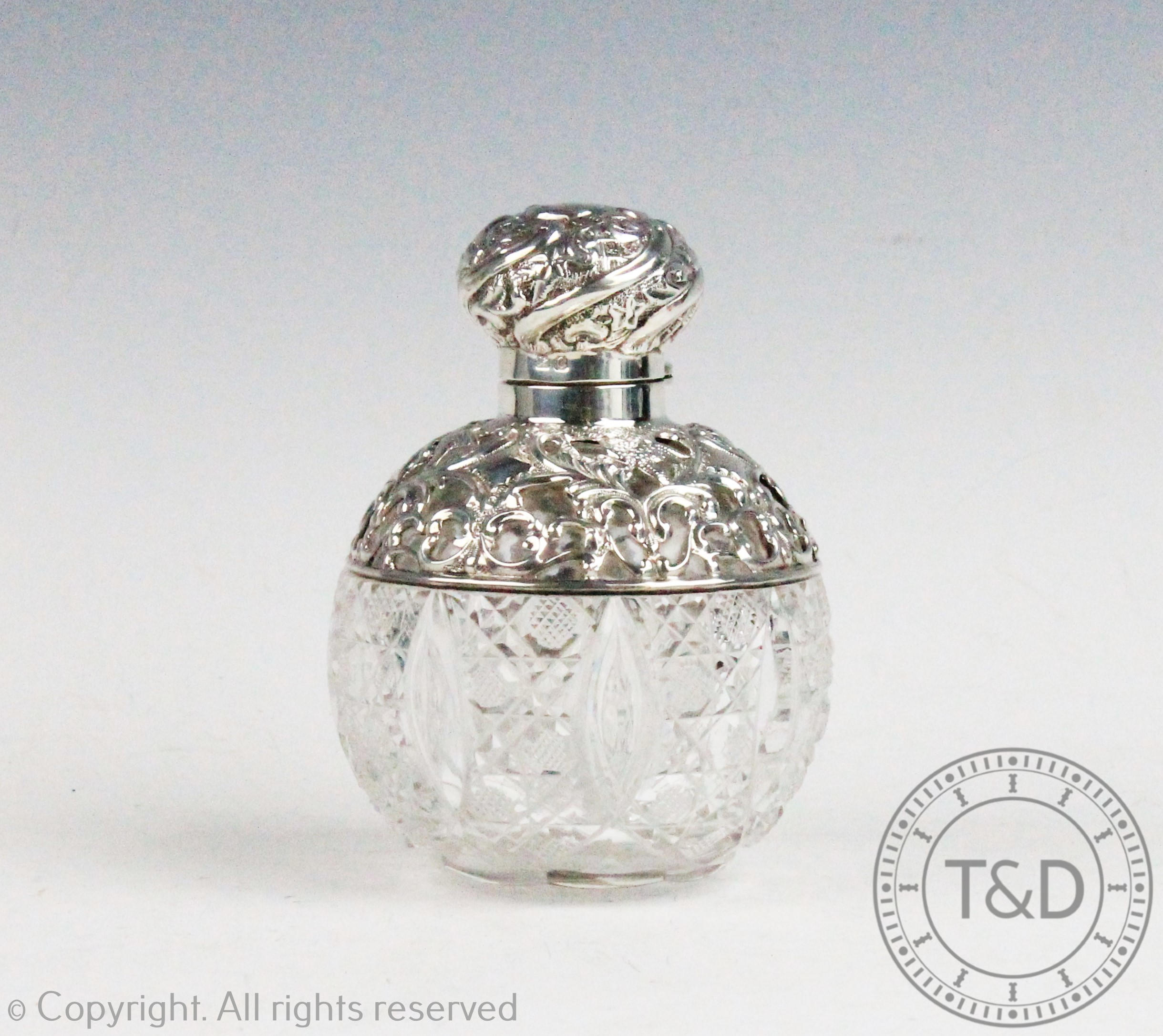 A silver mounted glass scent bottle, James Deakin & Sons, Chester 1897,