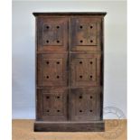 An early 20th century pitch pine food cupboard, with six cupboard doors, on plinth base,