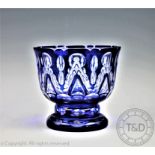 A Bohemian blue flashed glass bowl, with wheel cut detailing,