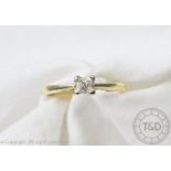 A diamond solitaire ring, the princess cut diamond within four claw white metal setting,