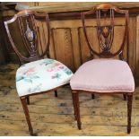 A set of six Edwardian inlaid mahogany Sheraton style chairs, in the manner of Edwards and Roberts,