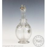 A Humphrey Taylor of London four division glass decanter, named 'Pricota Apricot Brandy', 'Kummel',