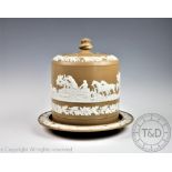 A late 19th century cheese bell and base, applied with cameo mounts depicting fox hunting,