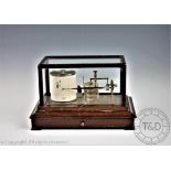 A Casella of London mahogany cased brass barograph, with base drawer,