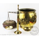 An early 20th century embossed brass jardiniere / coal bucket, 34cm high,