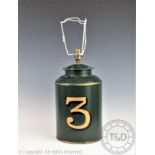 A modern toleware type table lamp, modelled as a tea canister and numbered '3', 40cm high,