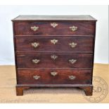 A George III and later mahogany chest, of four long drawers, on bracket feet,