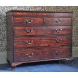 An early 19th century mahogany chest,