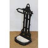 A Coalbrookdale style cast iron stick stand, with tray,