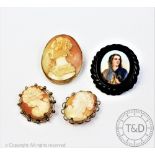 Three carved shell cameo brooches, to include, a lady wearing a bonnet in profile,