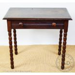 A late 17th century style oak side table with drawer, on bobbin turned legs,