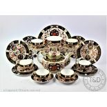 A Crown Derby Imari 198 pattern matched tea set, comprising six cups,
