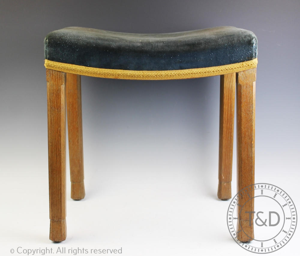 A 1953 Queen Elizabeth II Coronation stool, with curved seat and chamfered limed oak legs,