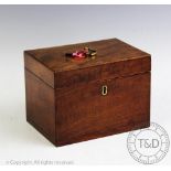 An early 19th century and later mahogany tea caddy, of rectangular form,