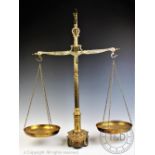 A pair of large 20th century brass weighing scales,