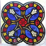 A 19th century lead and stained glass window panel of quatrefoil shape, 30.