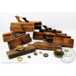 A collection of twelve assorted woodworking planes, to include named Austin examples,