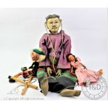 Two Pelham Puppets comprising, a Scotsman, 34cm high and a dancer in a pink dress,
