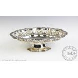 An Edwardian silver fruit bowl, S Glass, Birmingham 1906, of oval form,