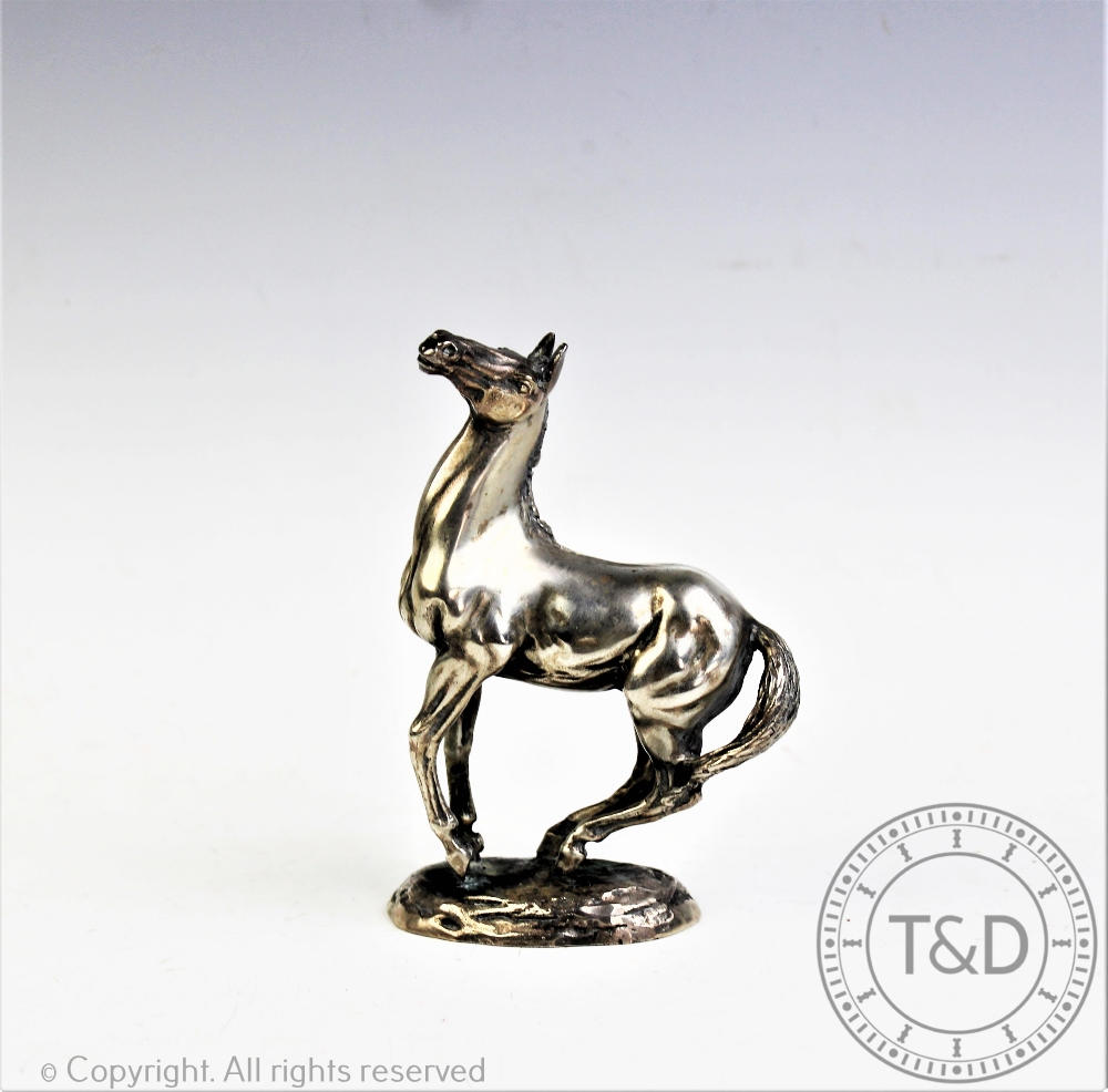 A British Horse Society silver sculpture of a horse 'Playing Up', by Lorne McKean,