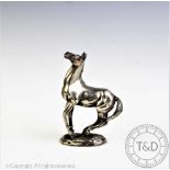 A British Horse Society silver sculpture of a horse 'Playing Up', by Lorne McKean,