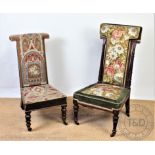 A Victorian carved walnut prie dieu chair, with column sides and floral tapestry upholstery,