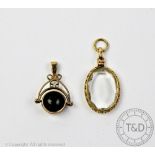 A rock crystal set Victorian pendant, of oval form, with yellow metal pierced frame, 4.