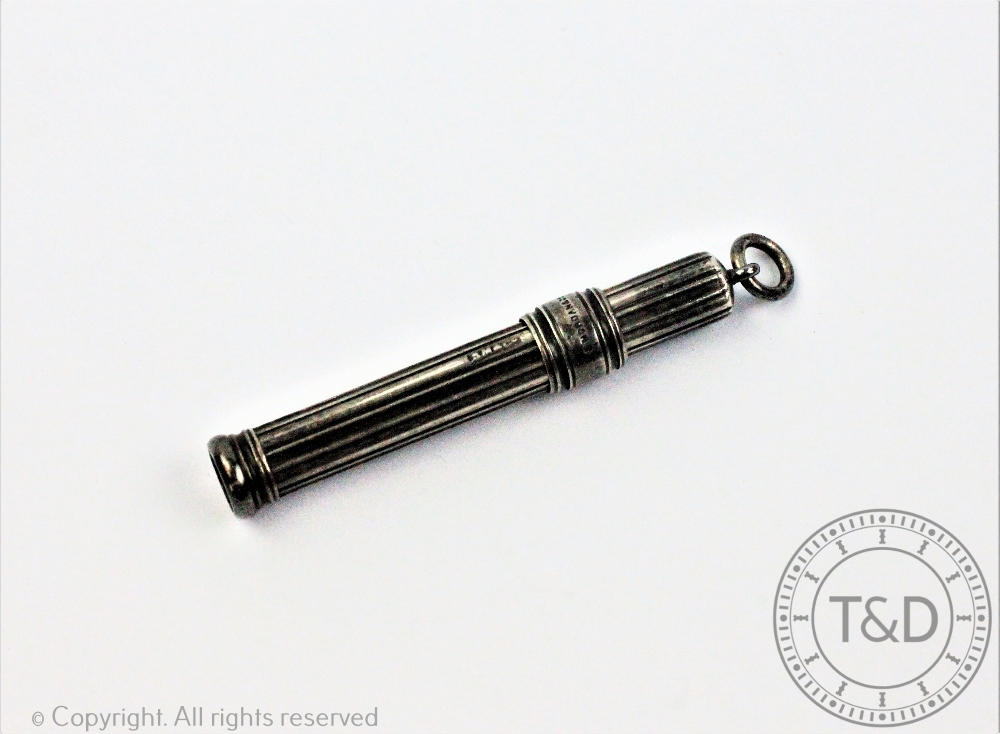 A Sampson Mordan silver retractable pencil, London 1919, of fluted design and with suspension loop,