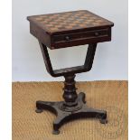 A William IV mahogany games table, with boxwood and coromandel checkered top and drawer,